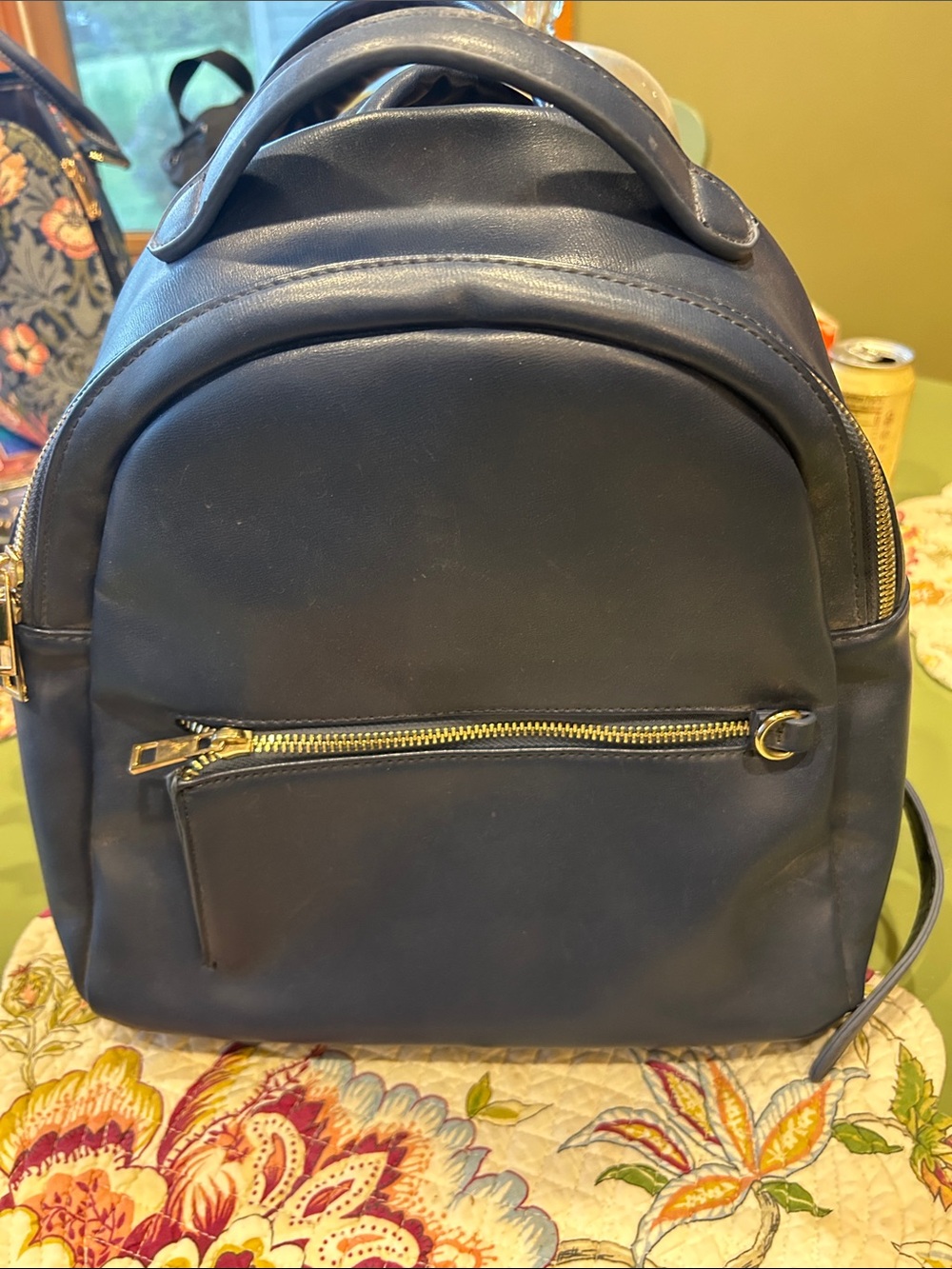 Compact Navy Leather Backpack with Gold Hardware